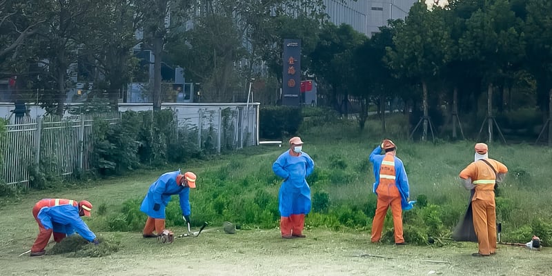 Detail from other photo. Too low resolution to really stand alone, but I love the set of poses of the workers.